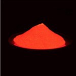 Orange red glowing powder
